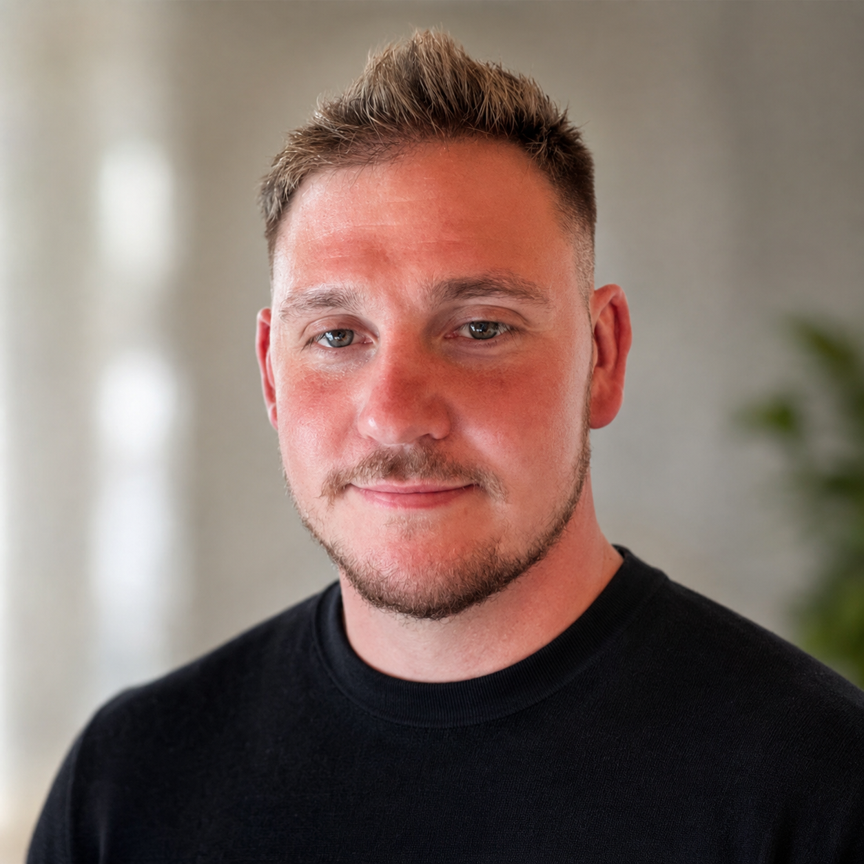 Professional headshot of Jason Gates